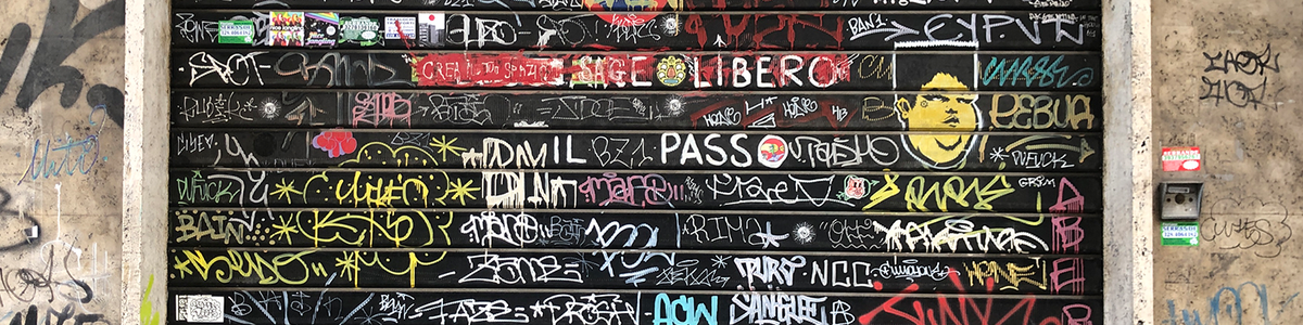 Roller door covered in tags graffiti||||||||||||Tunnel full of graffiti