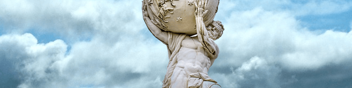 Photo of a statue holding the world on its shoulders.|||