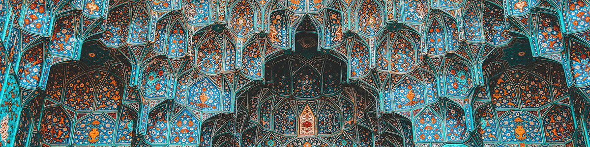 red blue and yellow floral textile in building in Iran|