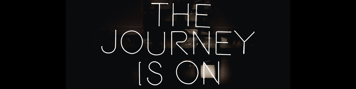 Sign saying 'The Jouney is on'