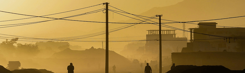 silhouette of person standing on hill during daytime|||