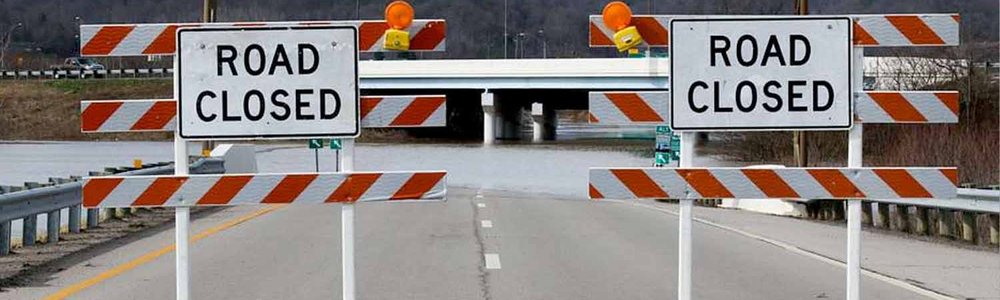 Photo of two road closed signs