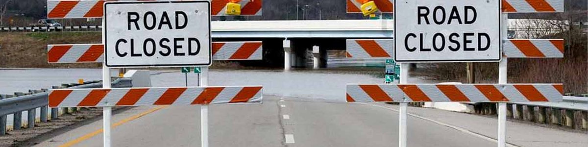 Photo of two road closed signs