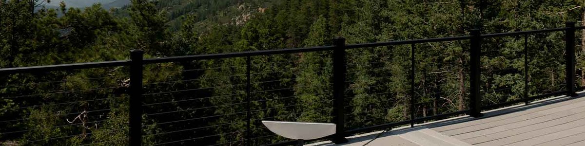 Photo of a Starlink dish set up in a forest.|||