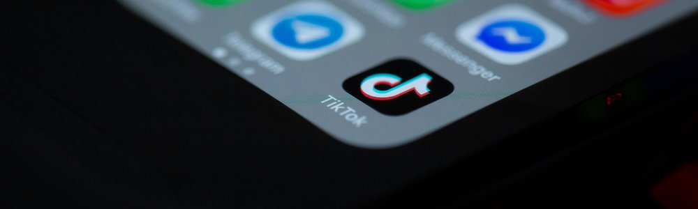 Photo of a smart phone showing the TikTok app|||