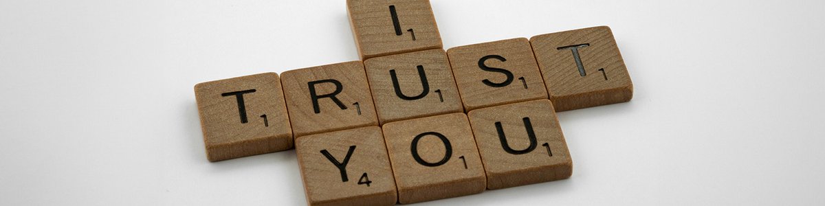 Scrabble letters spelling out 'I trust you'|Time series graph showing the percentage of partially and fully protected routes globally