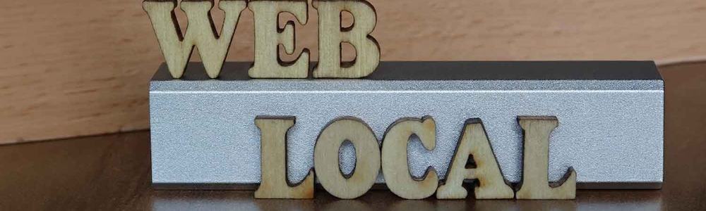 Photo of a sign saying 'Web Local'