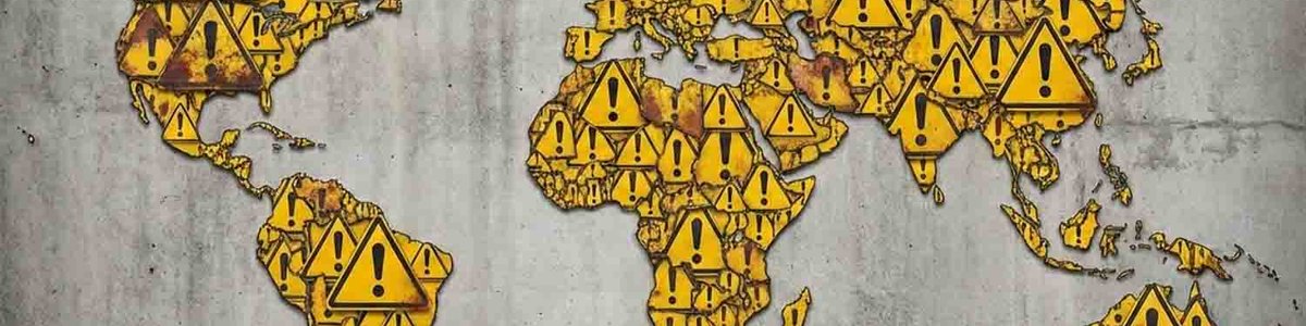 Illustration of a world map made out of warning signs||