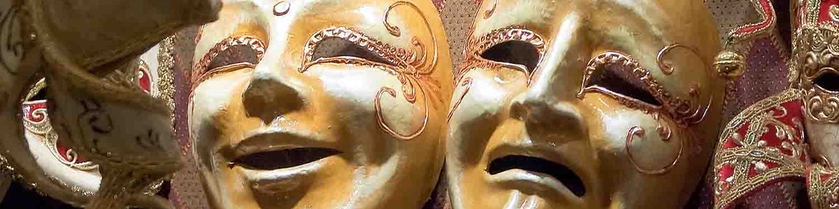 Photo of a happy and a sad mask