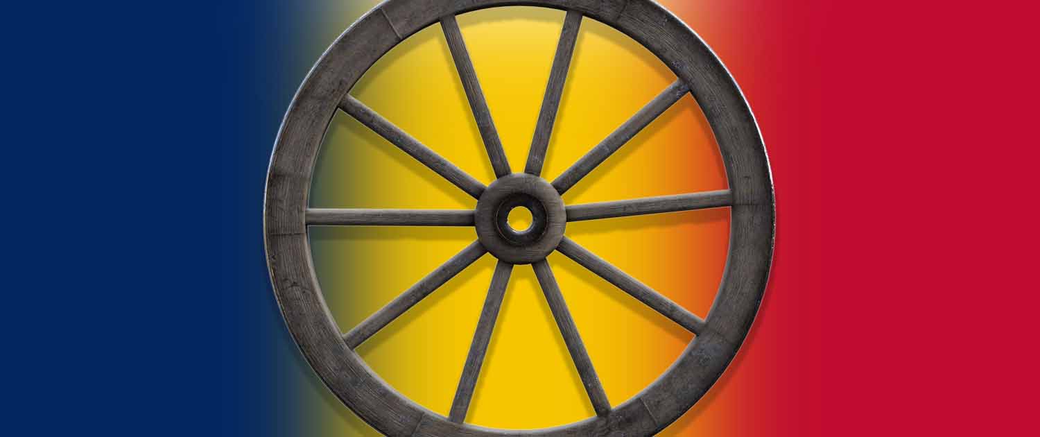 A wagon wheel against a Chad flag background