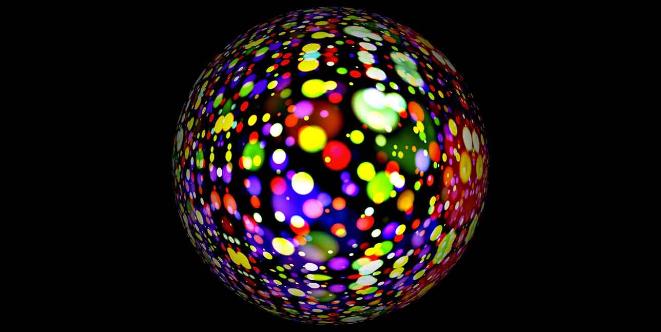 Multi coloured ball on black background