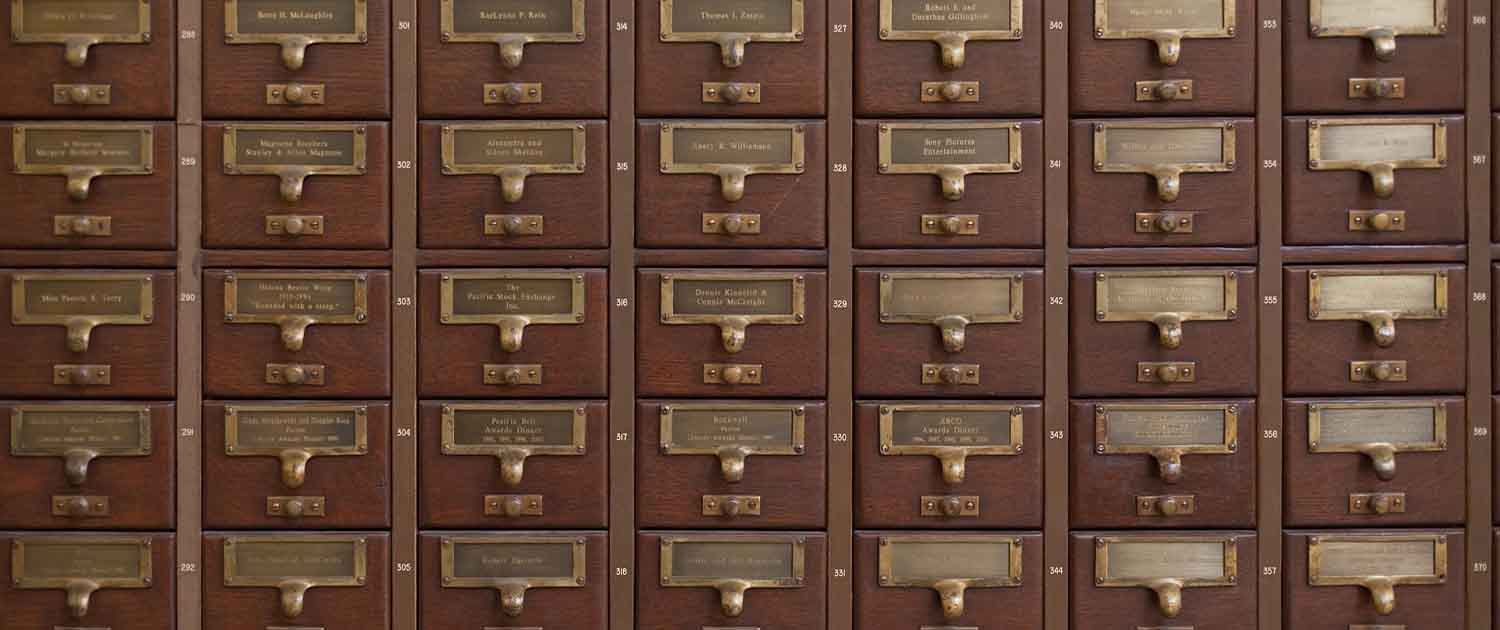 Photo of a stack of card catalog drawers