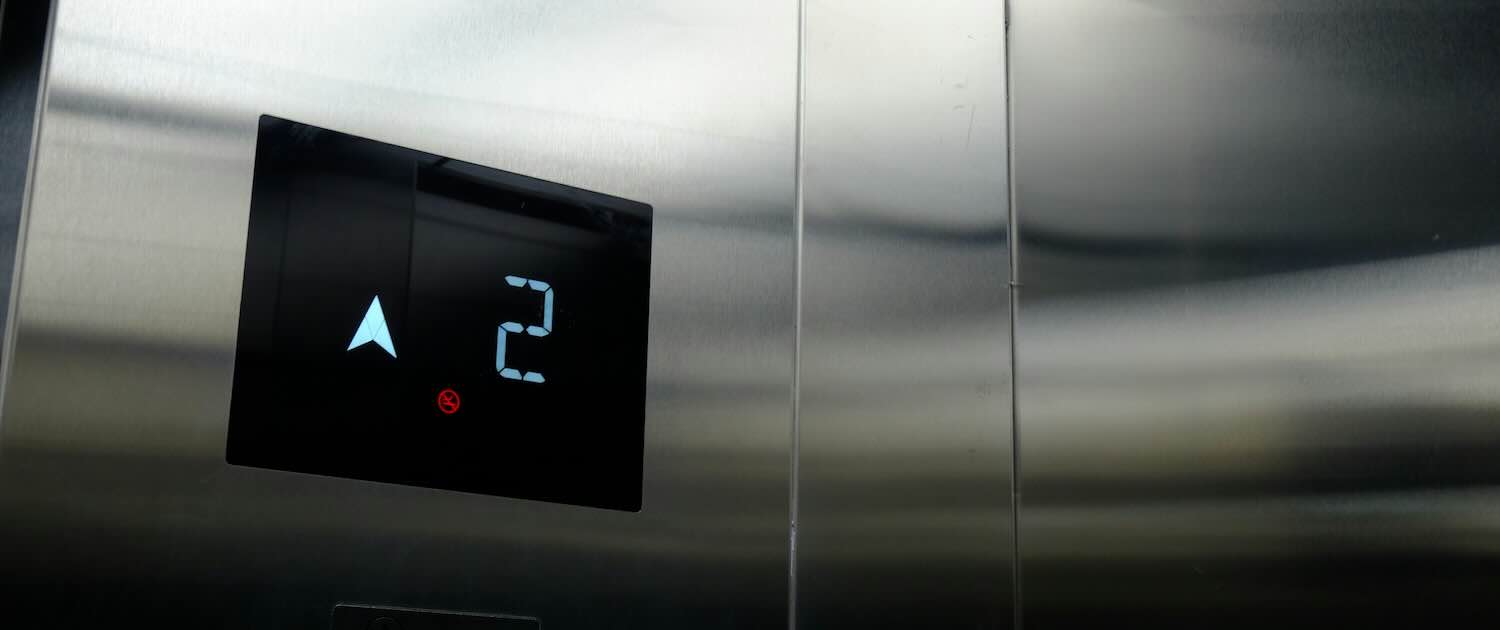 Photo of inside an elevator going up